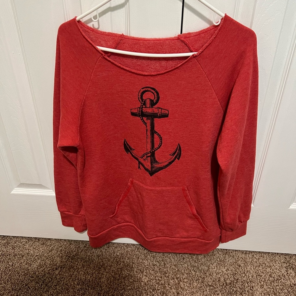 Cute sweatshirt with open top and front pocket.